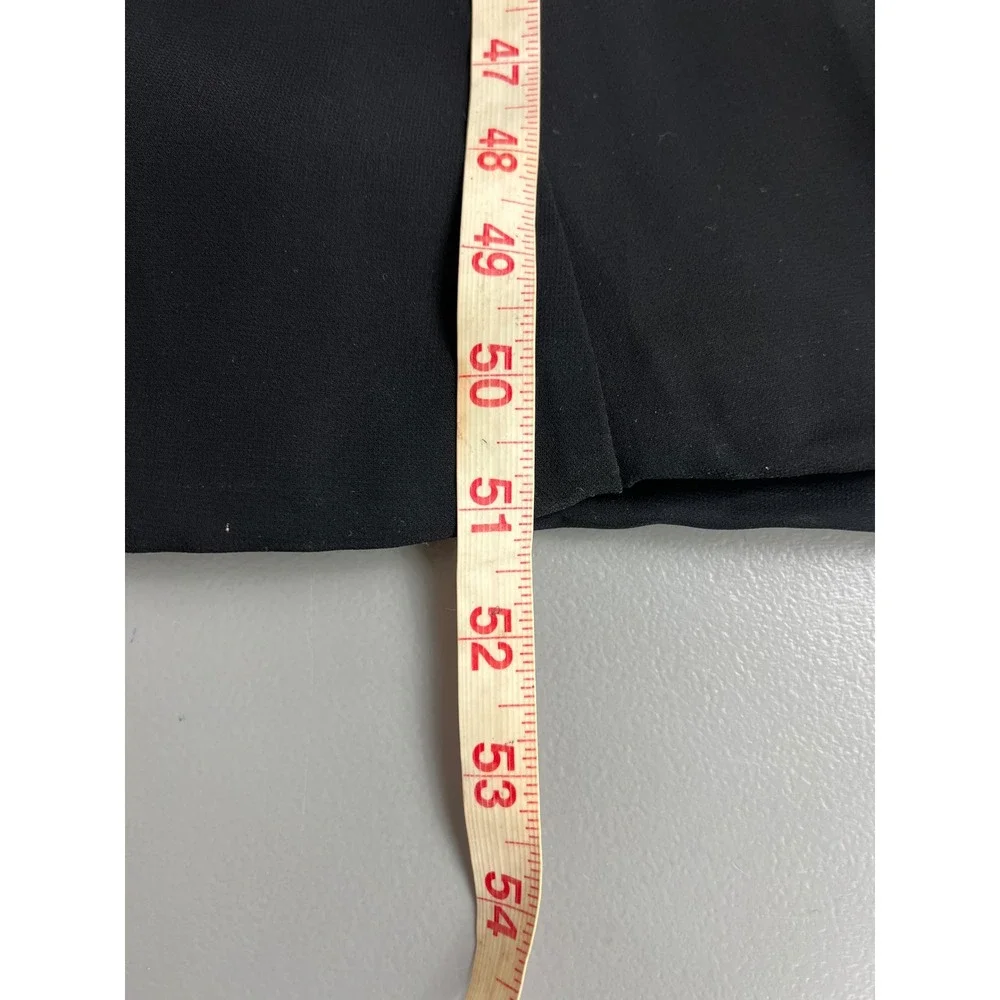 Formal Black High Neck Open Back Evening Gown with Satin Bow Detail Floor Length - Picture 8 of 9